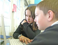 Students at work on a text Students at work on a text